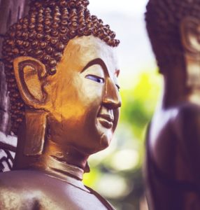 Figur eines Buddhas als Buddhismus Symbole